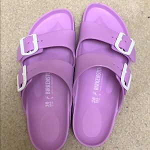 birkenstock’s- purple and waterproof slides